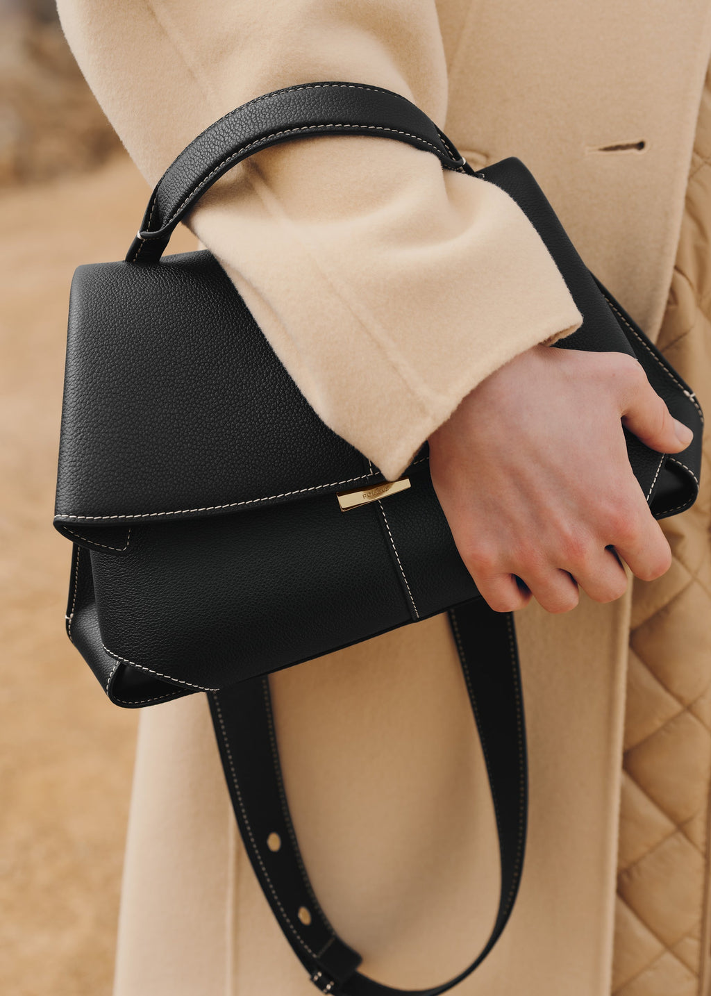 Mokki
EDITION TEXTURED BLACK WITH ECRU STITCHING