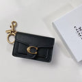 COACH® | Mini Tabby Bag Charm In Black