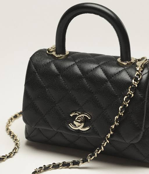 Chanel Coco Handle Flap quilted leather bag ( medium)