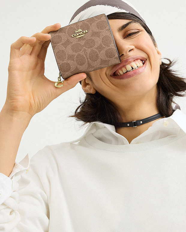 Coach Snap Wallet In Signature Canvas Brown