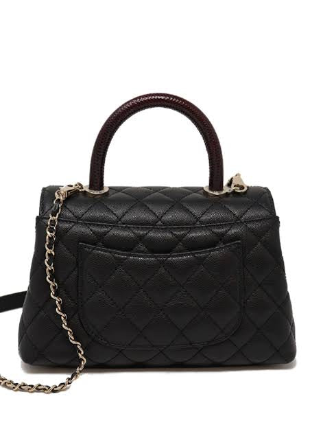 Chanel Coco Handle Flap quilted leather bag ( medium)