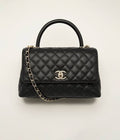 Chanel Coco Handle Flap quilted leather bag ( medium)